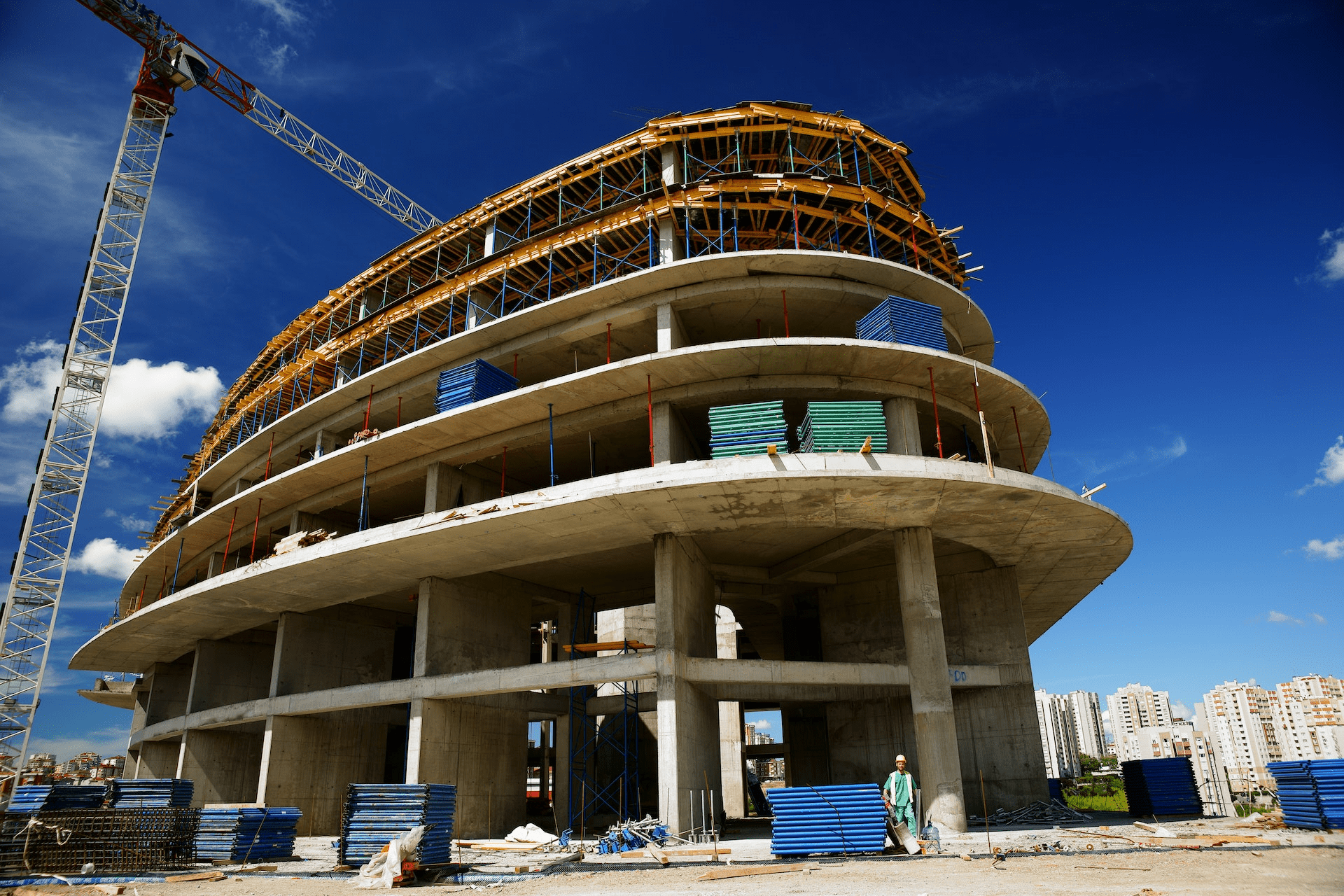 A construction site with workers using virtual reality technology to plan and develop the project